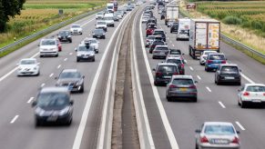 Motorists Driving In Highway Traffic