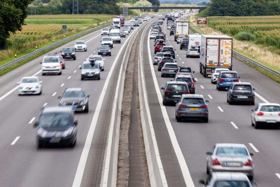 Motorists Driving In Highway Traffic