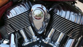 Indian Motorcycle's V-Twin engine with the logo on the plate in between the engines.