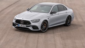 2021 Mercedes-AMG E 63 S sedan parked on an open air strip.