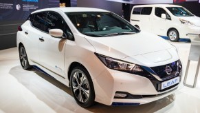 A white Nissan Leaf.