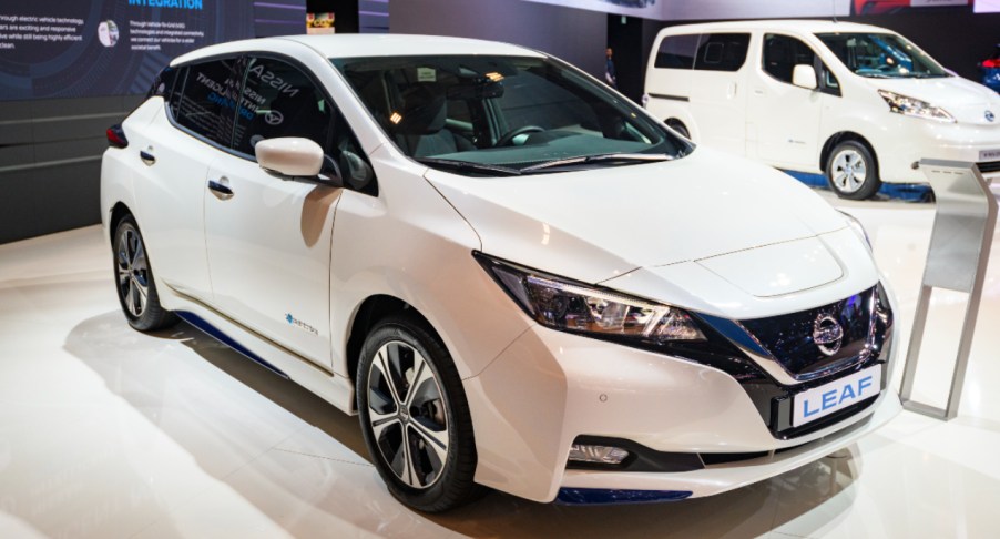 A white Nissan Leaf.