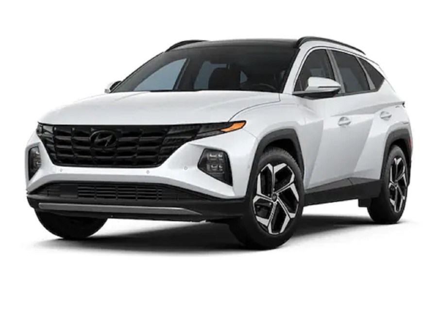 A white 2022 Hyundai Tucson against a white background.