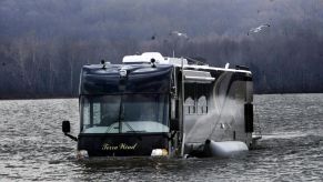 The Terra Wind amphibious motorcoach RV model traveling through water