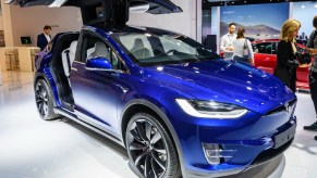 A blue Tesla Model X 90D full electric luxury crossover SUV car on display at Brussels Expo on January 9, 2020 in Brussels, Belgium.