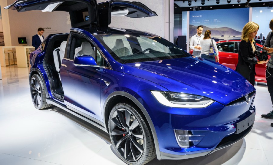 A blue Tesla Model X 90D full electric luxury crossover SUV car on display at Brussels Expo on January 9, 2020 in Brussels, Belgium.