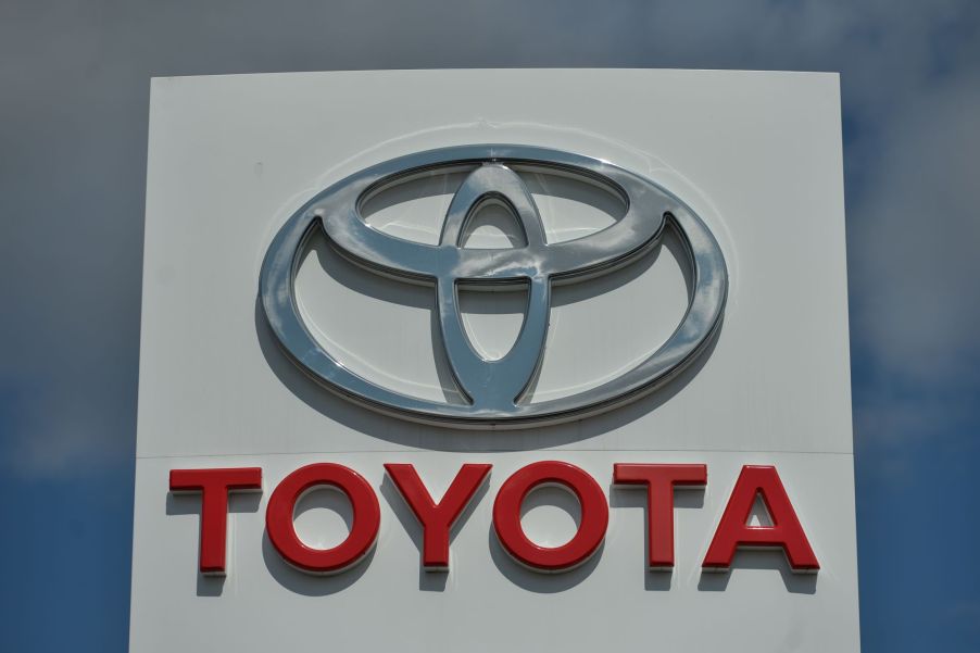 Toyota dealership sign with the logo and company name written underneath.