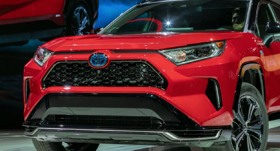 A red Toyota RAV4 Hybrid.