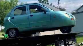 Super rare EV, the 2006 Zap Xebra found on Facebook marketplace seen on a trailer painted in a teal blue