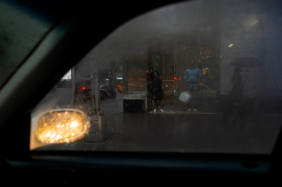 Pedestrians are seen through a car window on July 8, 2021, in Manhattan, New York City