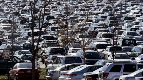 Cars fill a parking lot. Consumers had six major complaints about cars in 2020.