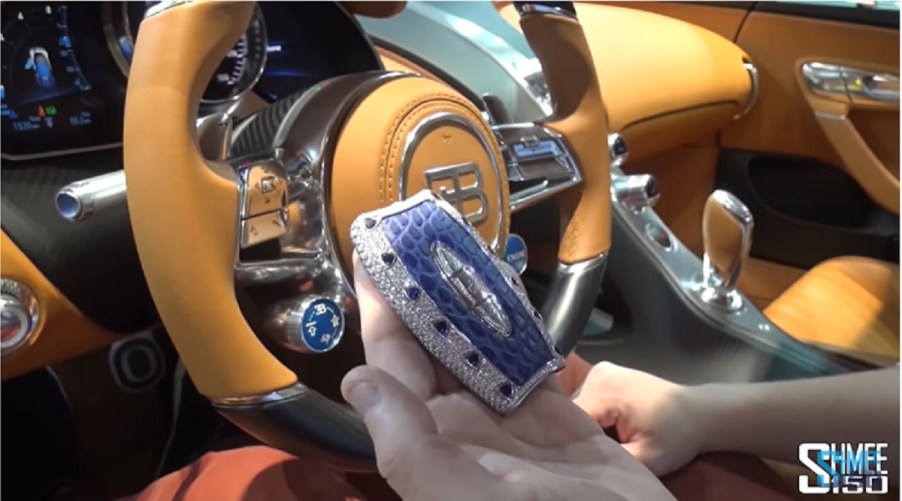 A diamond encrusted key fob for a Bugatti Chiron.