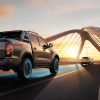 the 2021 Nissan Navara driving over a bridge