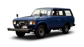 A dark-blue 1980 Toyota Land Cruiser FJ60 '60 Series'