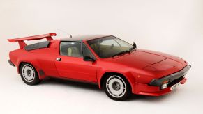 A red 1984 Lamborghini Jalpa S with a rear spoiler