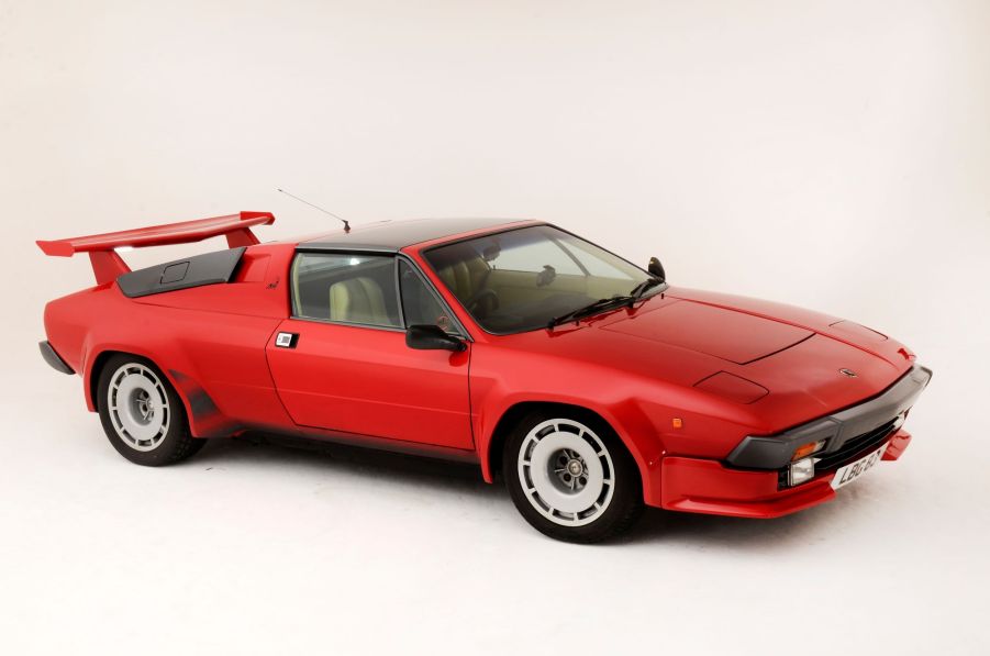 A red 1984 Lamborghini Jalpa S with a rear spoiler