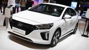 A white Hyundai IONIQ Plug-In Hybrid on the floor of Paris Motor Show, 2018.