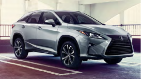 A silver 2016 Lexus RX in a parking garage.