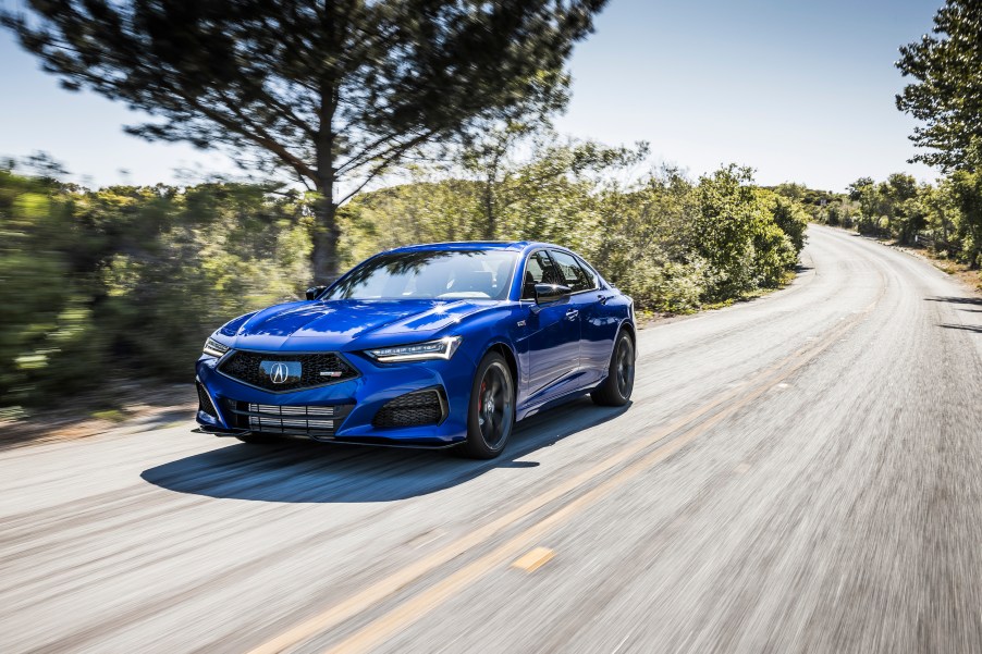 2021 Acura TLX Type S in blue driving down the road