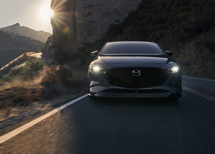 The new Mazda 3, seen here in grey, on a California back road