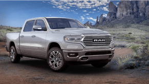 A silver 2022 Ram 1500 Longhorn Southfork parked in the desert