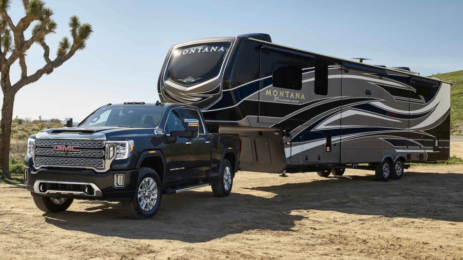 A 2022 GMC Sierra HD Denali pulls a large RV