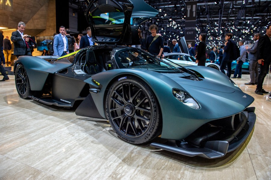 A blue Aston Martin Valkyrie hypercar on display at the 2019 Geneva International Motor Show