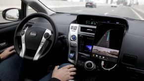 A car driving down the road illustrating the levels of automation from Yandex.