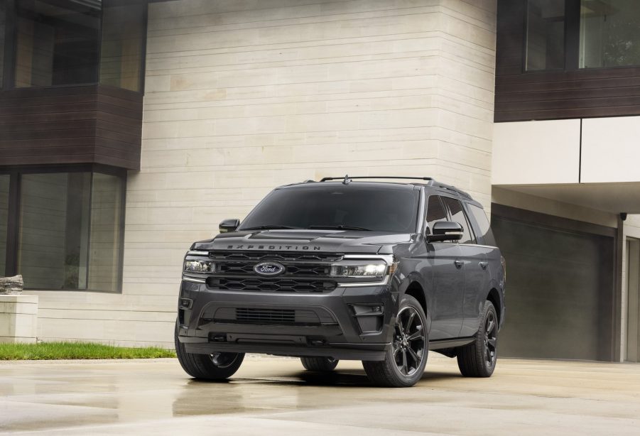 Black 2022 Ford Expedition Stealth Edition Performance Package parked in front of a white building