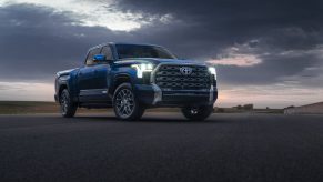 Blue 2022 Toyota Tundra with a cloudy sky in the background