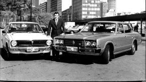 Vintage Toyotas in black and white photo