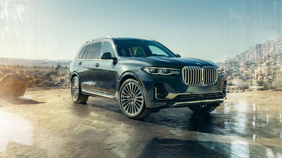 Dark blue 2022 BMW X7 parked on a desert landscape