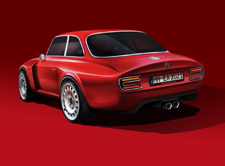 The rear 3/4 view of a red Emilia Auto Alfa Romeo Giulia GT Veloce restomod