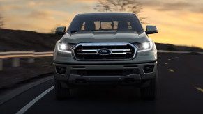 Front view of gray Ford Ranger with the headlamps turned on