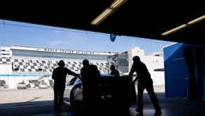 This is a Next Gen NASCAR race car being pushed onto Daytona International Speedway. The Next GEn NASCAR race cars will make the 2022 season more exciting.