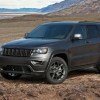 A dark gray Jeep Grand Cherokee in the desert.