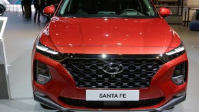 The South-Korean car manufacturer Hyundai displays a red Hyundai Santa Fe SEVEN 2.2 CRDI SUV at the 2019 Internationale Automobil-Ausstellung (IAA).