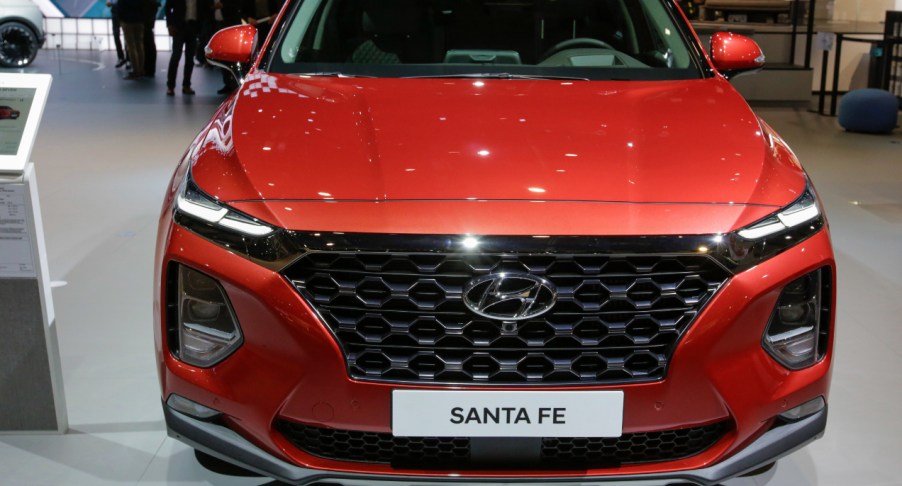 The South-Korean car manufacturer Hyundai displays a red Hyundai Santa Fe SEVEN 2.2 CRDI SUV at the 2019 Internationale Automobil-Ausstellung (IAA).