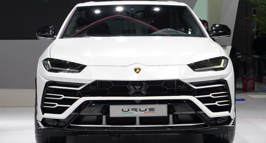 A white Lamborghini Urus is displayed during the 19th Shanghai International Automobile Industry Exhibition, also known as Auto Shanghai 2021, at National Exhibition and Convention Center (Shanghai) on April 20, 2021 in Shanghai, China.