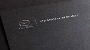 A Mazda Financial Services plaque