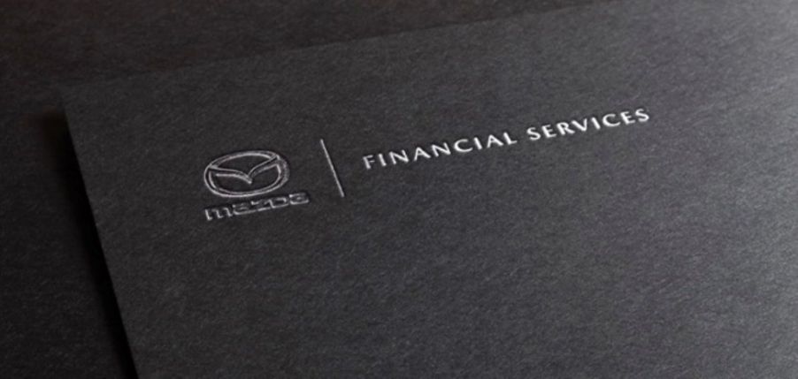 A Mazda Financial Services plaque