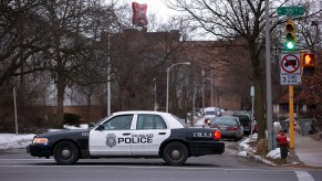 Milwaukee police car in an intersection.