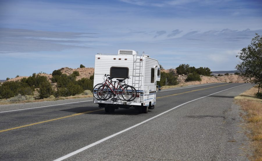 RV Driving Down Scenic Road