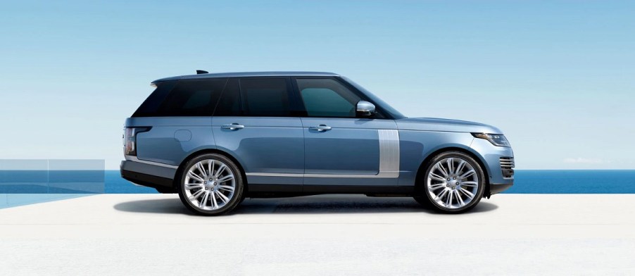 A blue 2021 Land Rover Range Rover at a beach.