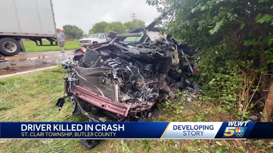 The steel coil rolled off a truck onto a Ford Edge