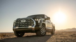 A black 2022 Toyota Tundra with an extended cab parked at a desert.