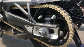 The gold-linked BMW M Endurance chain mounted on a 2021 S 1000 RR