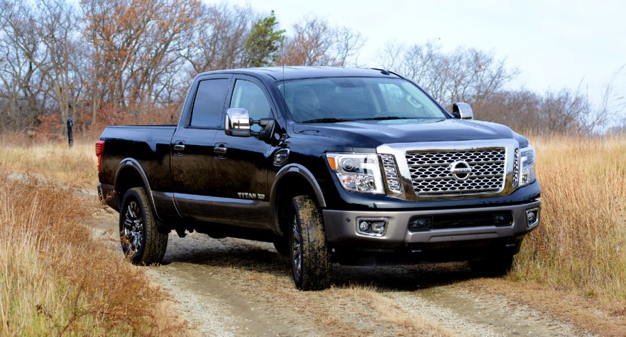 A black Nissan Titan pickup truck.