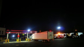 Trucks staying overnight at a rest stop/gas station