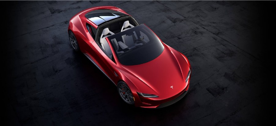 A red Tesla Roadster from above.